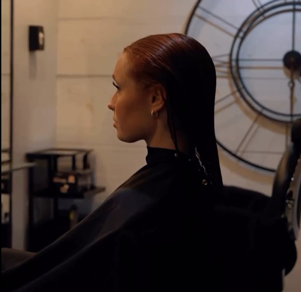 women in salon chair